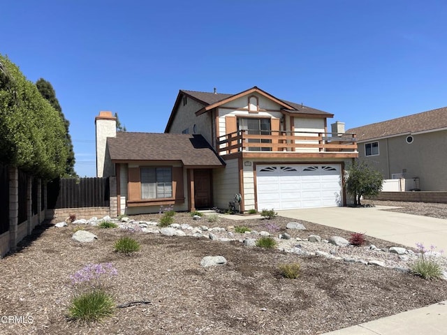traditional-style home with a chimney, concrete driveway, fence, an attached garage, and a balcony