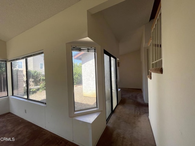 doorway to outside with carpet floors