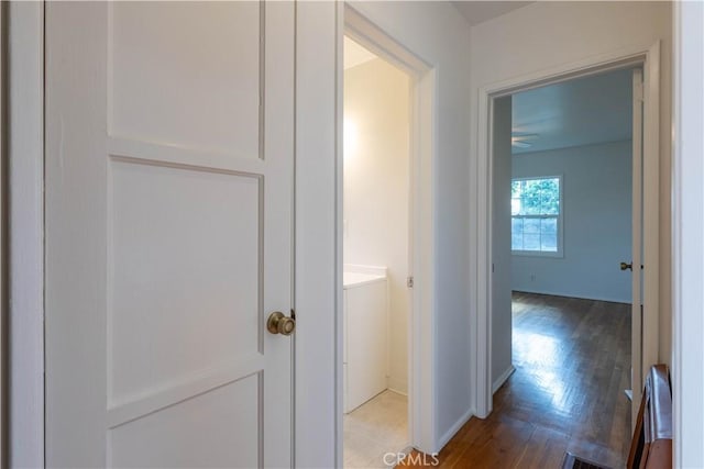5032 Verdura Ave, Lakewood, CA 90712 - hallway with baseboards and wood finished floors