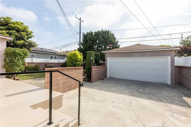 detached garage with fence