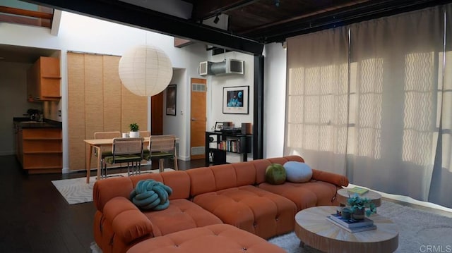 1250 Powell St Unit 10, Emeryville, CA 94608 - living room with wood finished floors, baseboards, and beamed ceiling