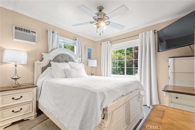 bedroom with crown molding, a wall mounted air conditioner, and a ceiling fan