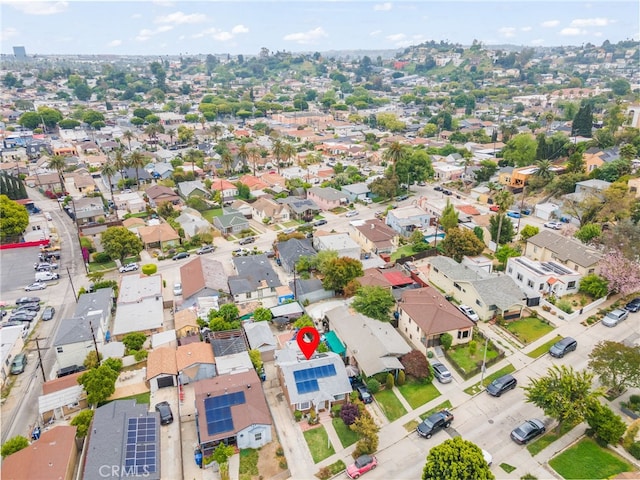 birds eye view of property with a residential view