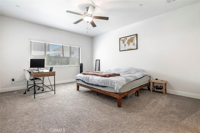 1628 N Delbert Ave, Fresno, CA 93722 - carpeted bedroom with a ceiling fan and baseboards