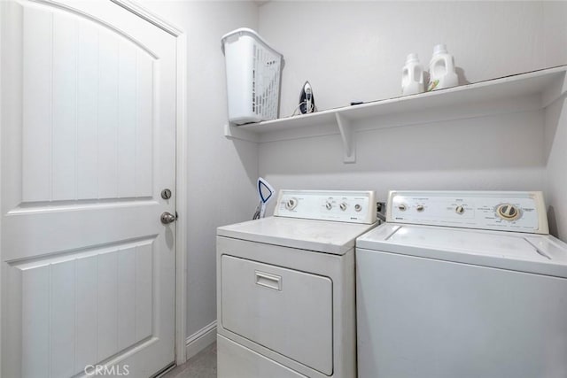 1628 N Delbert Ave, Fresno, CA 93722 - laundry area featuring washer and clothes dryer, baseboards, and laundry area