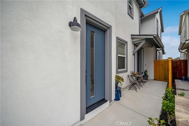 1866 Homestead Pl, San Luis Obispo, CA 93405 - view of exterior entry with stucco siding and fence