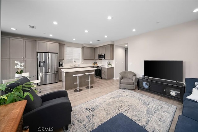 1866 Homestead Pl, San Luis Obispo, CA 93405 - living area with light wood-style floors and recessed lighting