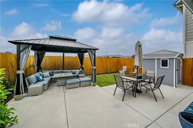 1866 Homestead Pl, San Luis Obispo, CA 93405 - view of patio / terrace featuring an outdoor living space, a storage unit, outdoor dining space, a fenced backyard, and an outdoor structure