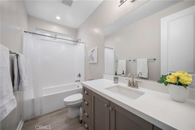 1866 Homestead Pl, San Luis Obispo, CA 93405 - bathroom featuring wood finished floors, toilet, vanity, shower / tub combo, and recessed lighting