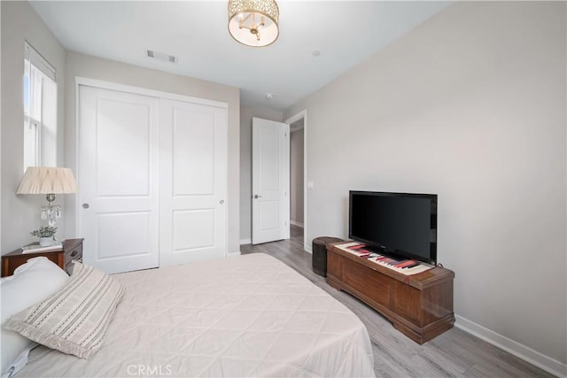 1866 Homestead Pl, San Luis Obispo, CA 93405 - bedroom featuring wood finished floors, baseboards, and a closet
