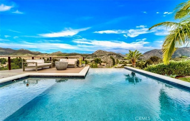 2836 Mesa Grove Rd, Fallbrook, CA 92028 - swimming pool with a mountain view and an outdoor hangout area