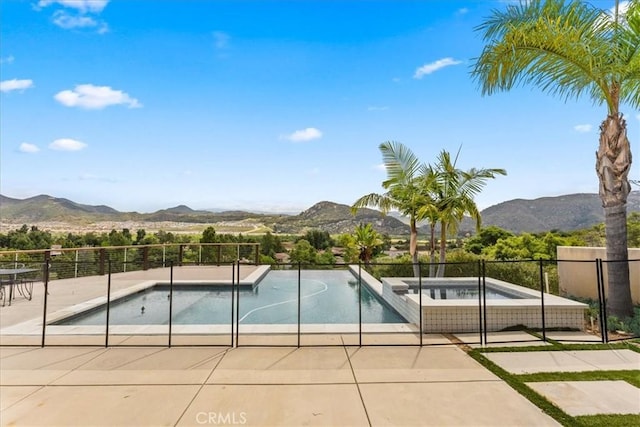 2836 Mesa Grove Rd, Fallbrook, CA 92028 - view of swimming pool with a mountain view, a patio area, a pool with connected hot tub, and fence