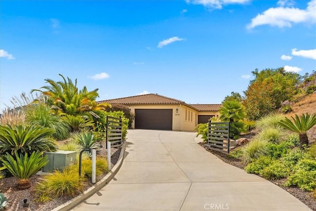 2836 Mesa Grove Rd, Fallbrook, CA 92028 - view of front facade with driveway, a tiled roof, a garage, and stucco siding