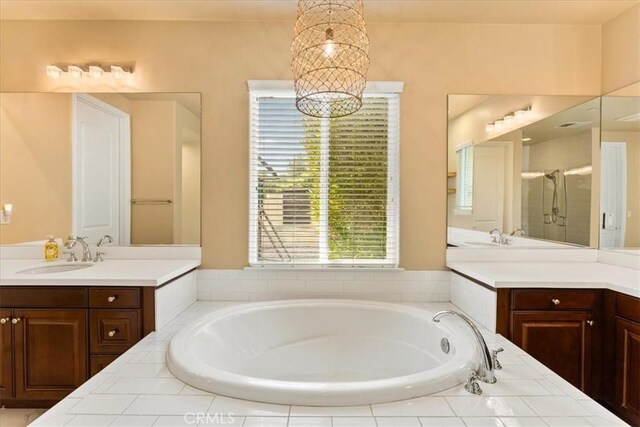 2836 Mesa Grove Rd, Fallbrook, CA 92028 - bathroom featuring a bath, a stall shower, and two vanities