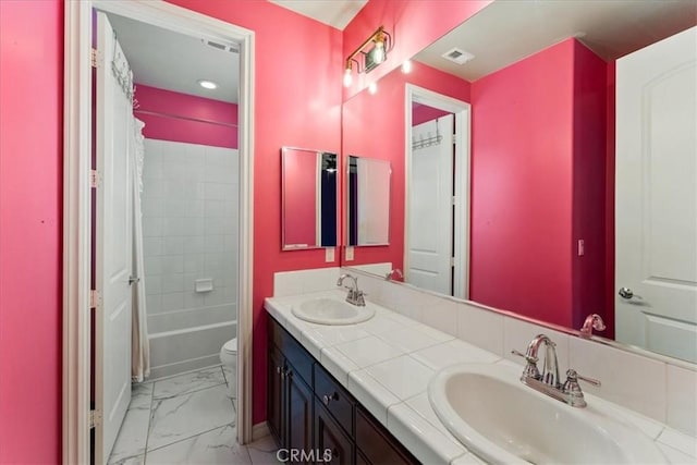 2836 Mesa Grove Rd, Fallbrook, CA 92028 - full bath featuring marble finish flooring, double vanity, toilet, and shower / bath combo with shower curtain