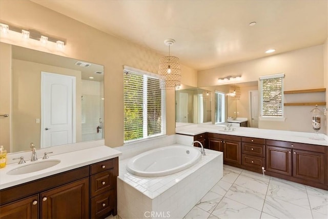 2836 Mesa Grove Rd, Fallbrook, CA 92028 - bathroom featuring vanity, a bath, healthy amount of natural light, marble finish flooring, and recessed lighting