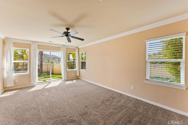 2836 Mesa Grove Rd, Fallbrook, CA 92028 - empty room featuring ceiling fan, ornamental molding, carpet floors, and healthy amount of natural light