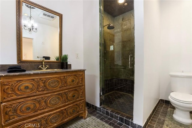 bathroom with a stall shower, vanity, toilet, tile patterned flooring, and visible vents