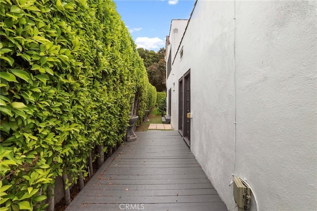 view of side of property with stucco siding