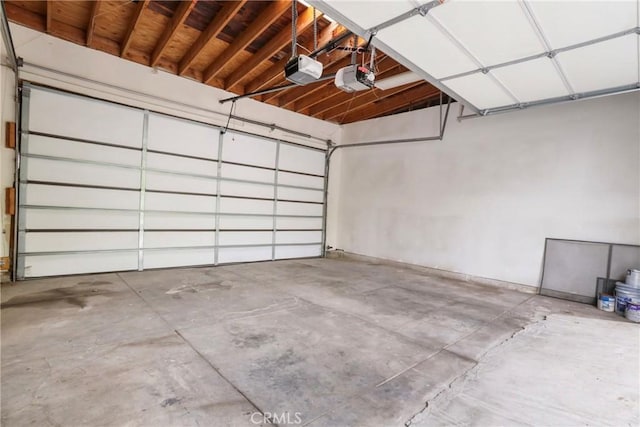garage featuring a garage door opener