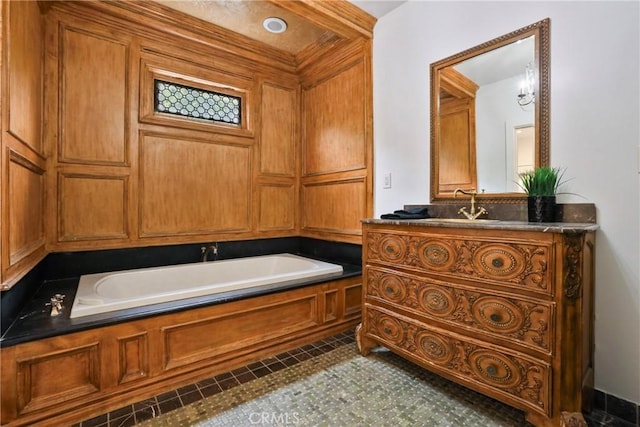 bathroom featuring a bath and vanity