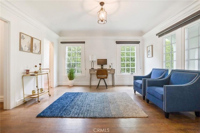 living area featuring wood finished floors and baseboards