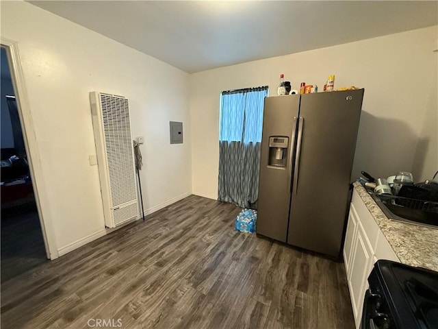 5442 6th Ave, Los Angeles, CA 90043 - kitchen with stainless steel refrigerator with ice dispenser, a heating unit, gas stove, dark wood-style flooring, and electric panel