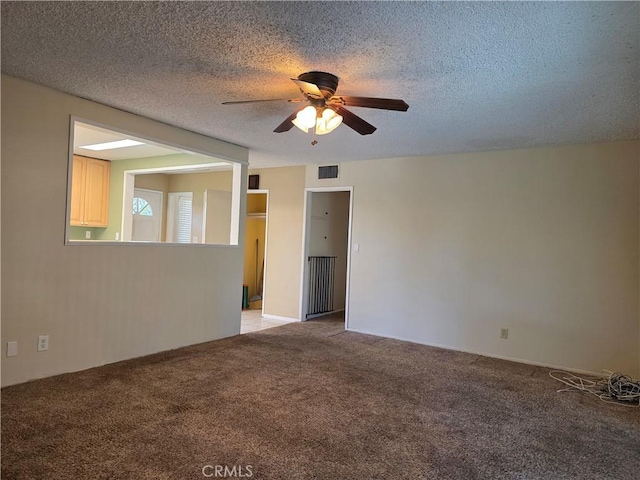 1370 S Oriole St, Anaheim, CA 92804 - spare room featuring light colored carpet, a ceiling fan, and a textured ceiling