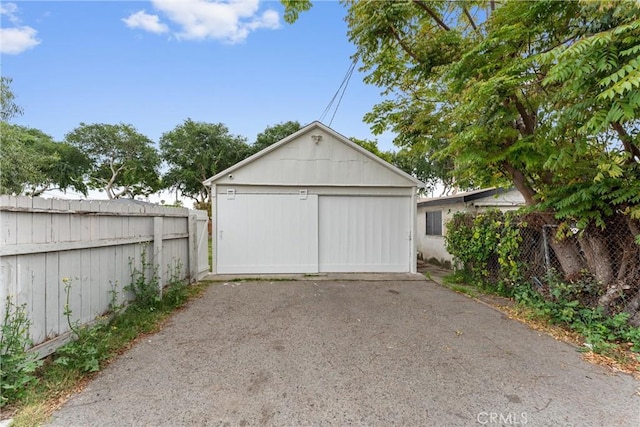 detached garage with fence