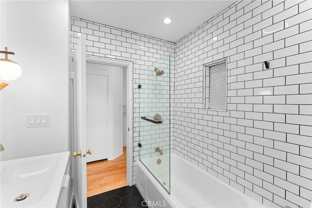 full bathroom with a sink, tile patterned floors, shower / tub combination, and recessed lighting