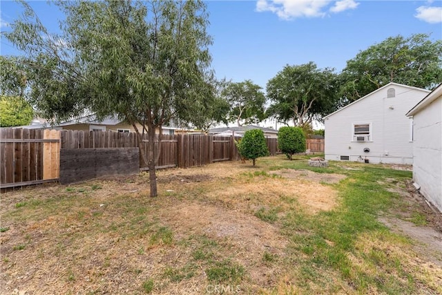 view of yard featuring a fenced backyard