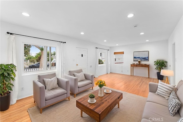 living room featuring recessed lighting and light wood finished floors
