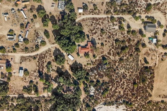 aerial view featuring a desert view and a rural view