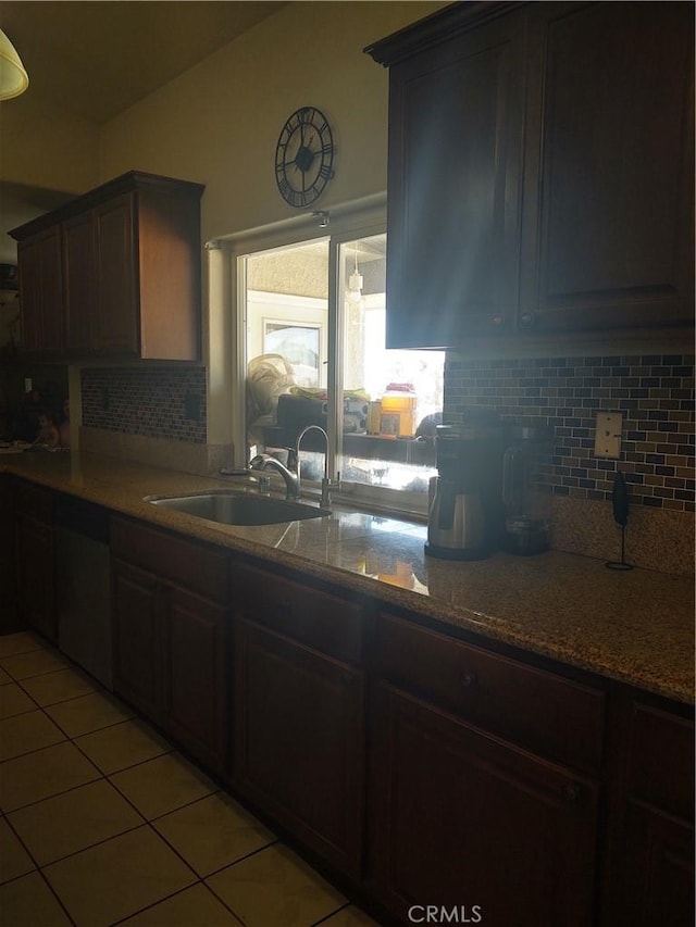 9373 Nevada Rd, Phelan, CA 92371 - kitchen featuring a sink, light tile patterned floors, tasteful backsplash, and light stone counters