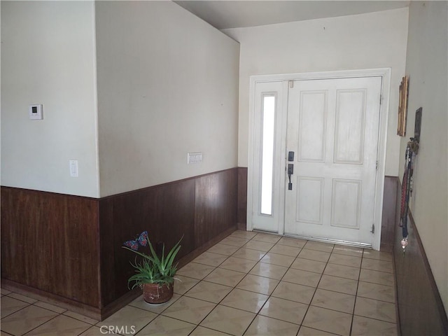 9373 Nevada Rd, Phelan, CA 92371 - foyer entrance with a wainscoted wall, wooden walls, and light tile patterned floors