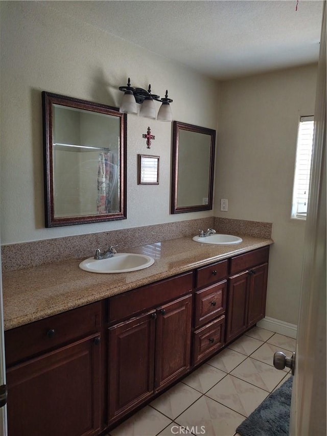 9373 Nevada Rd, Phelan, CA 92371 - bathroom featuring double vanity and tile patterned floors