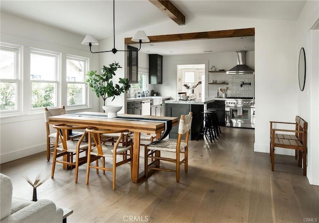 3702 Seneca Ave, Los Angeles, CA 90039 - dining room with wood-type flooring, vaulted ceiling with beams, and baseboards