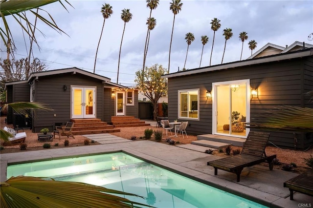 3702 Seneca Ave, Los Angeles, CA 90039 - rear view of house with a patio area, an outdoor pool, french doors, an outbuilding, and entry steps