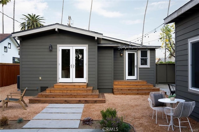 3702 Seneca Ave, Los Angeles, CA 90039 - rear view of house with fence, entry steps, and french doors