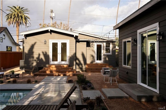 3702 Seneca Ave, Los Angeles, CA 90039 - back of house with french doors, an outdoor pool, fence, entry steps, and a patio
