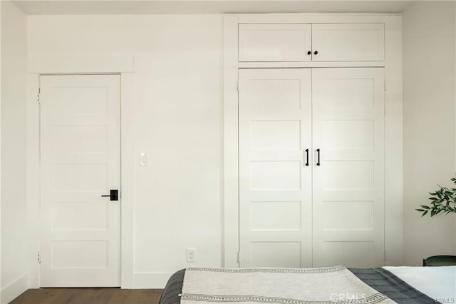 3702 Seneca Ave, Los Angeles, CA 90039 - bedroom featuring baseboards, a closet, and dark wood-style flooring
