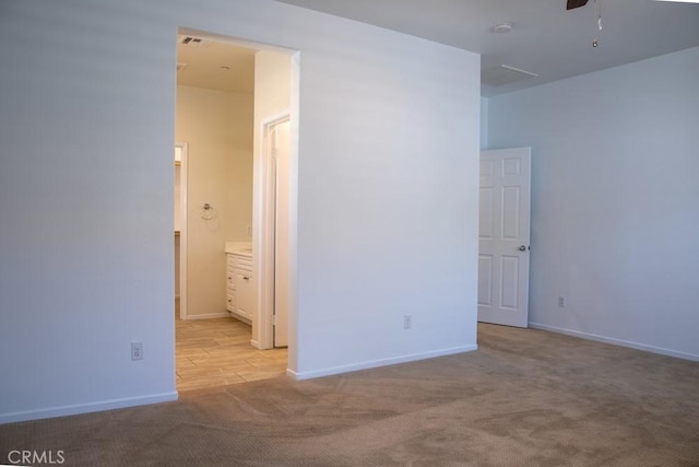 1334 Pinehurst Dr, Calimesa, CA 92320 - unfurnished room featuring baseboards, a ceiling fan, and carpet floors