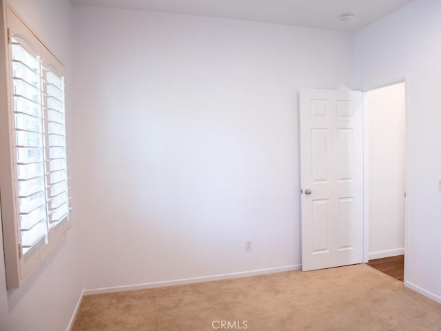 1334 Pinehurst Dr, Calimesa, CA 92320 - unfurnished room featuring light colored carpet and baseboards