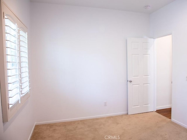 1334 Pinehurst Dr, Calimesa, CA 92320 - empty room with light colored carpet and baseboards