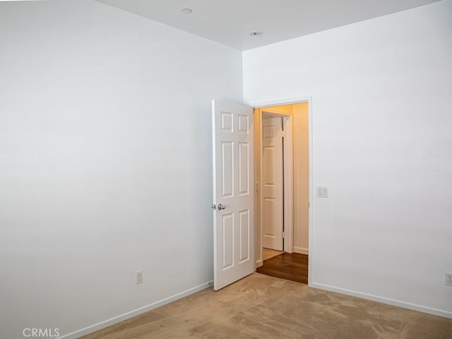 1334 Pinehurst Dr, Calimesa, CA 92320 - empty room featuring light carpet and baseboards