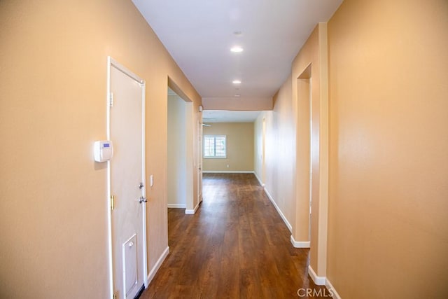 1334 Pinehurst Dr, Calimesa, CA 92320 - corridor with dark wood-style flooring, baseboards, and recessed lighting