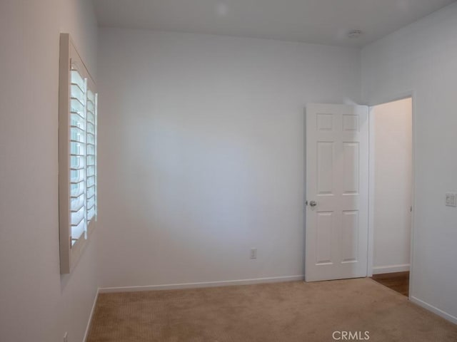 1334 Pinehurst Dr, Calimesa, CA 92320 - spare room featuring carpet flooring, baseboards, and a smoke detector