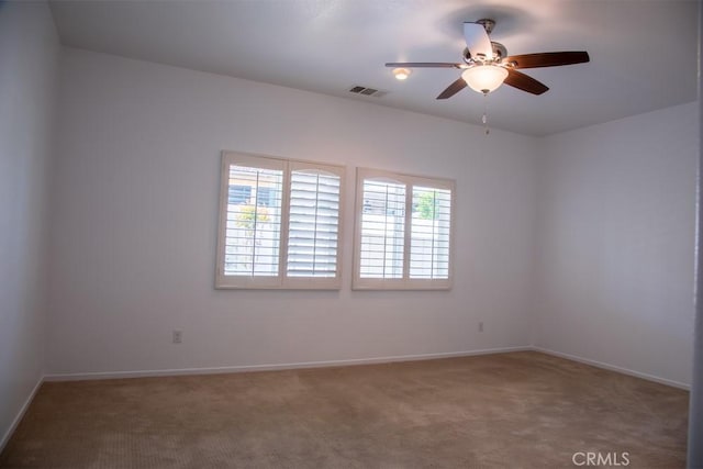 1334 Pinehurst Dr, Calimesa, CA 92320 - carpeted empty room with visible vents, ceiling fan, and baseboards