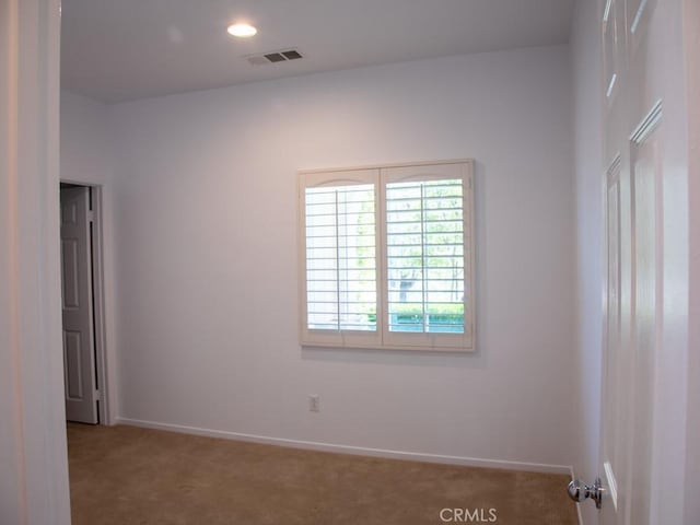 1334 Pinehurst Dr, Calimesa, CA 92320 - carpeted spare room with baseboards and visible vents