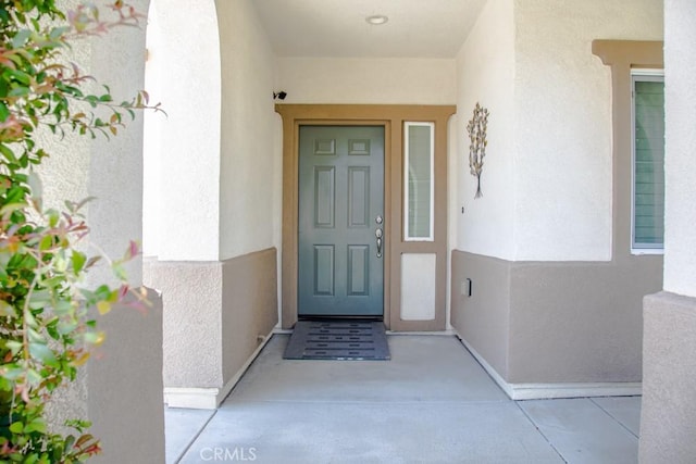 1334 Pinehurst Dr, Calimesa, CA 92320 - property entrance with stucco siding